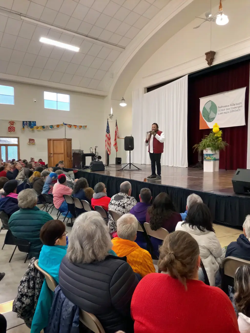 A photograph capturing a cultural event organized by A.N.A.C.R. LES AMIS DE LA RESISTANCE, such as a lecture, film screening, or commemorative ceremony, highlighting the organization's commitment to cultural initiatives.